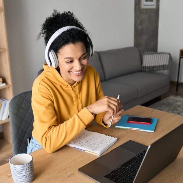 Young,Happy,Smiling,African,American,Adult,Student,Wearing,Headphones,Having